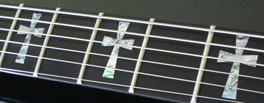 TONI IOMMI CROSS
